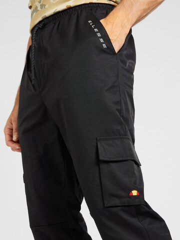 ELLESSE - Tapered Pantalón deportivo 'Apennine' en negro