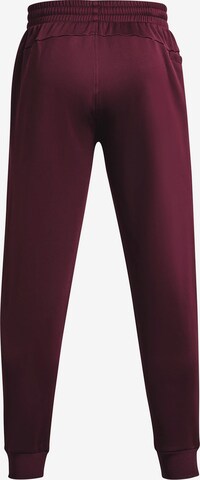 UNDER ARMOUR Tapered Sportbroek in Rood