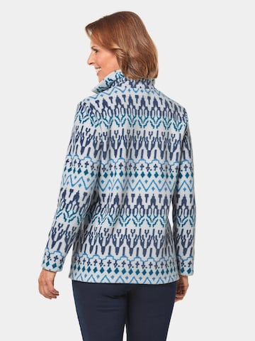 Goldner Pullover in Blau