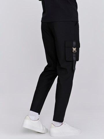 Loosefit Pantaloni cargo di SikSilk in nero