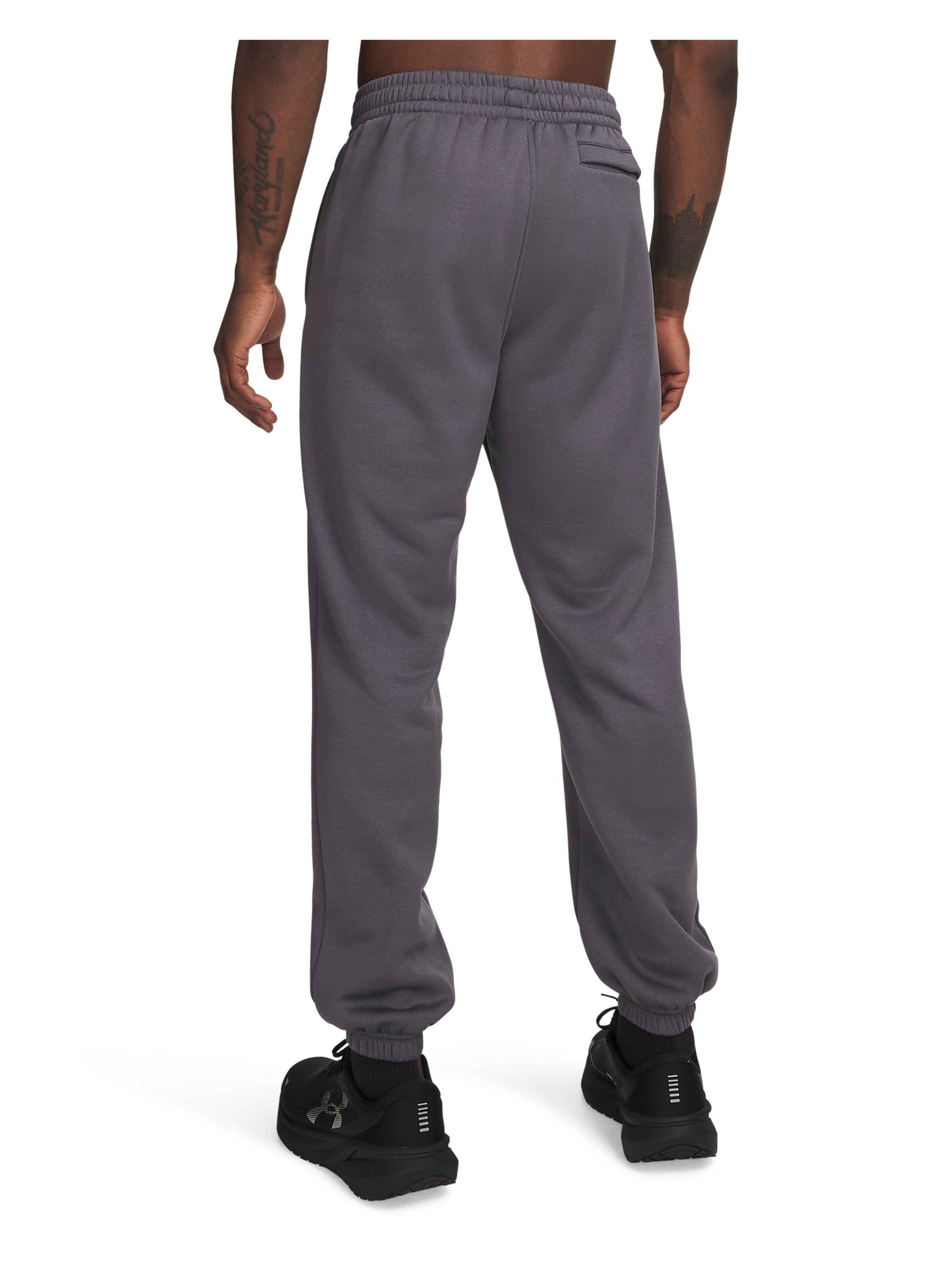 UNDER ARMOUR Tapered Sports trousers in Grey
