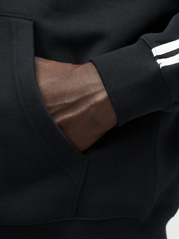 ADIDAS ORIGINALS Collegetakki 'Adicolor' värissä musta