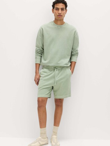 regular Pantaloni di Marks & Spencer in verde