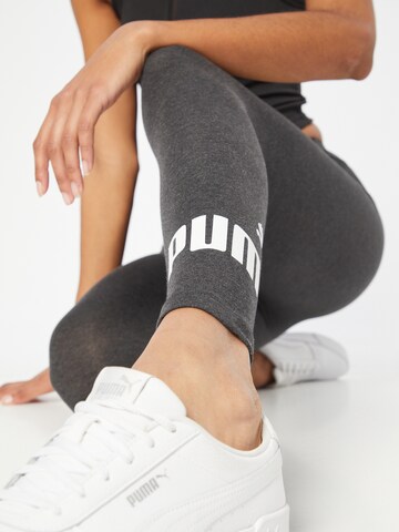 PUMA - Skinny Pantalón deportivo 'Essentials' en gris