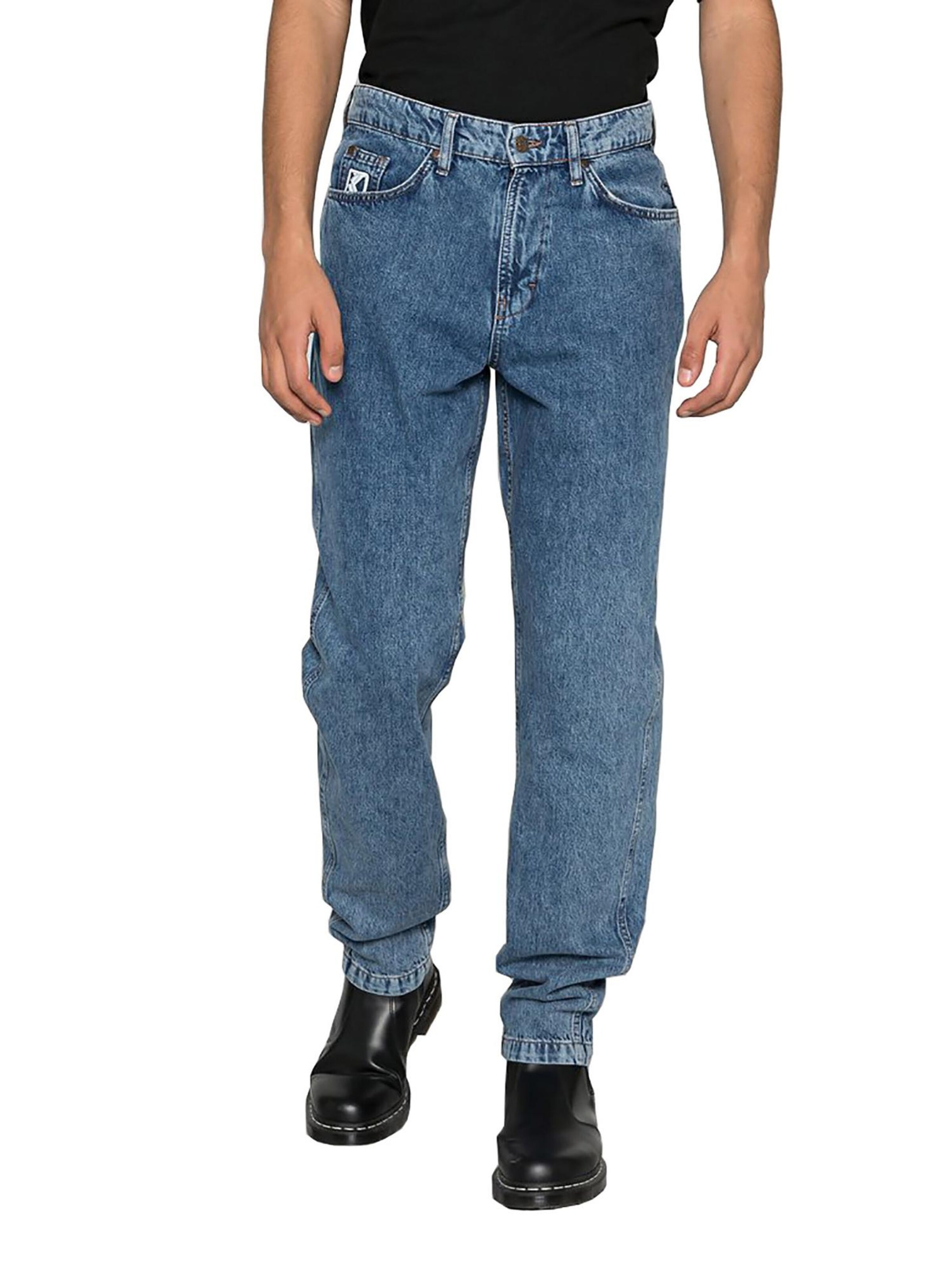 Karl Kani Regular Jeans 'Signaure Tapared' in Blue: front