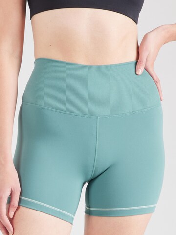 NIKE Skinny Workout Pants 'ONE' in Green