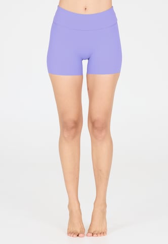 Athlecia Slim fit Leggings in Purple: front