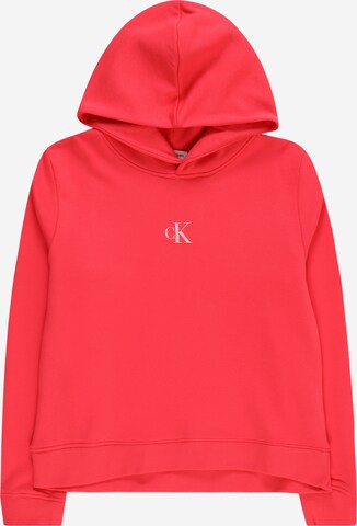 Sweat-shirt Calvin Klein Jeans en orange : devant