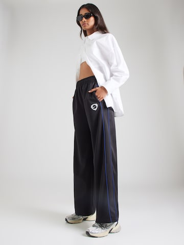 Nike Sportswear Zvonové kalhoty Kalhoty – černá