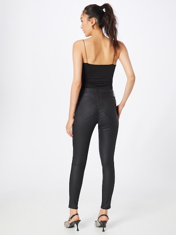 Skinny Jeans 'MOLLY' di River Island in nero