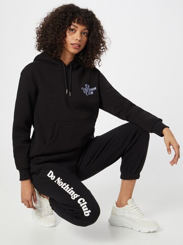 Effilé Pantalon 'Do Nothing Club' On Vacation Club en noir