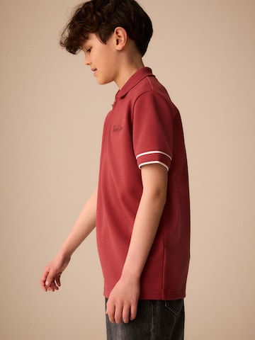 Next - Camiseta en rojo