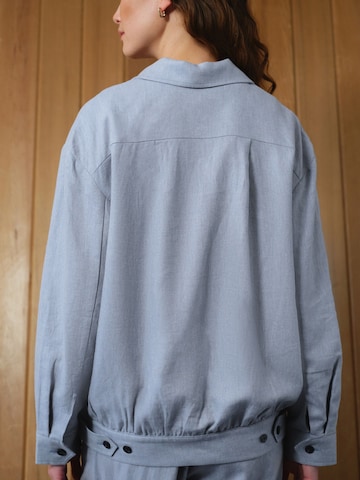 Next Tussenjas in Blauw