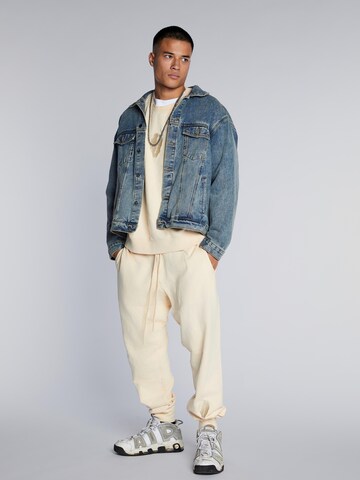 Loosefit Pantaloni 'Embroidered shell sweatpants' di BARRYAN in beige