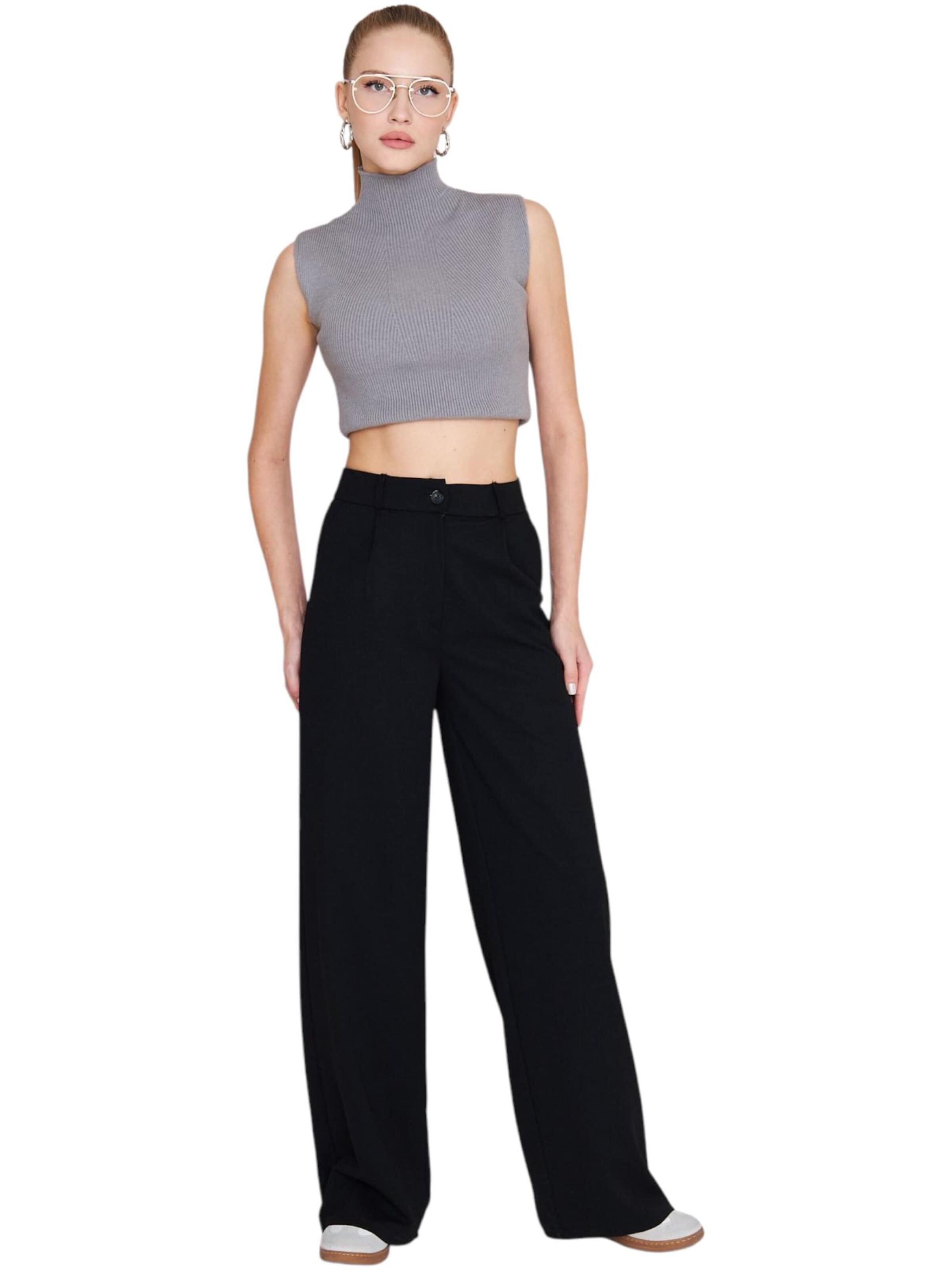 fashionshowcase - Pierna ancha Pantalón plisado 'Seyra' en negro