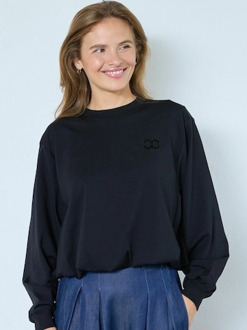 Pull-over 'Monty' co'couture en noir : devant