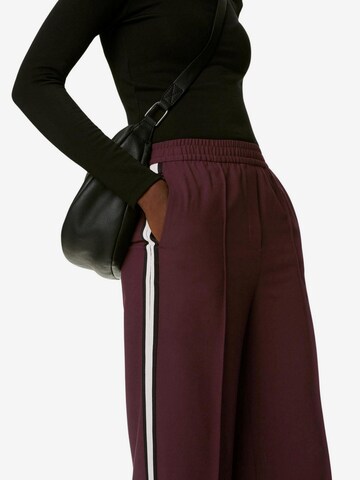 Wide leg Pantaloni di Marks & Spencer in rosso