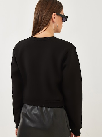 Bianco Lucci Sweatshirt in Schwarz