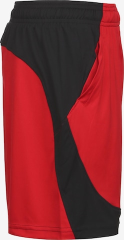 Regular Pantalon de sport 'SC30 Baseline' UNDER ARMOUR en rouge