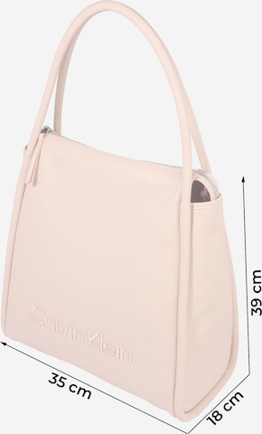 Calvin Klein Ročna torbica | bež barva