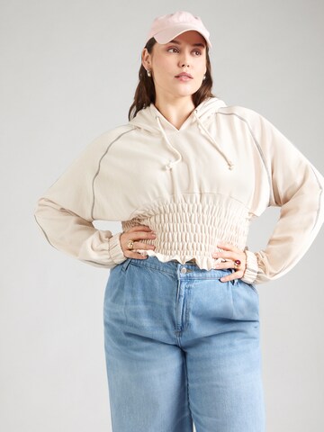 Public Desire Curve Sweatshirt in Braun: Vorderseite