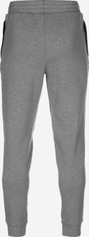 Tapered Pantaloni sportivi 'Dime' di PUMA in grigio
