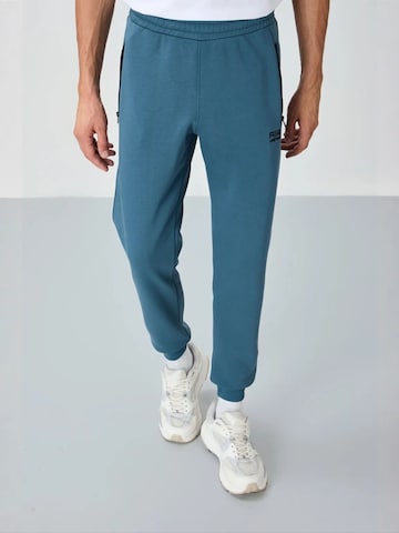Tommy Life Tapered Sports trousers 'Jogginghose' in Blue