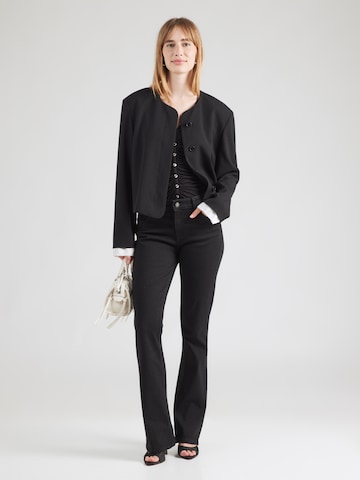 Bootcut Jeans di GUESS JEANS in nero