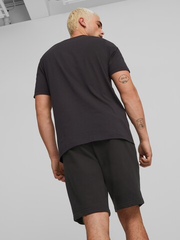 PUMA Sportshirt 'Essentials' in Schwarz