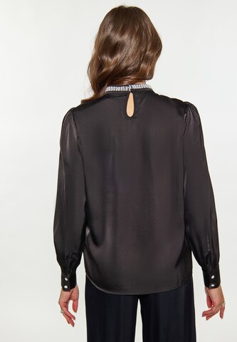 Camicia da donna di faina in nero