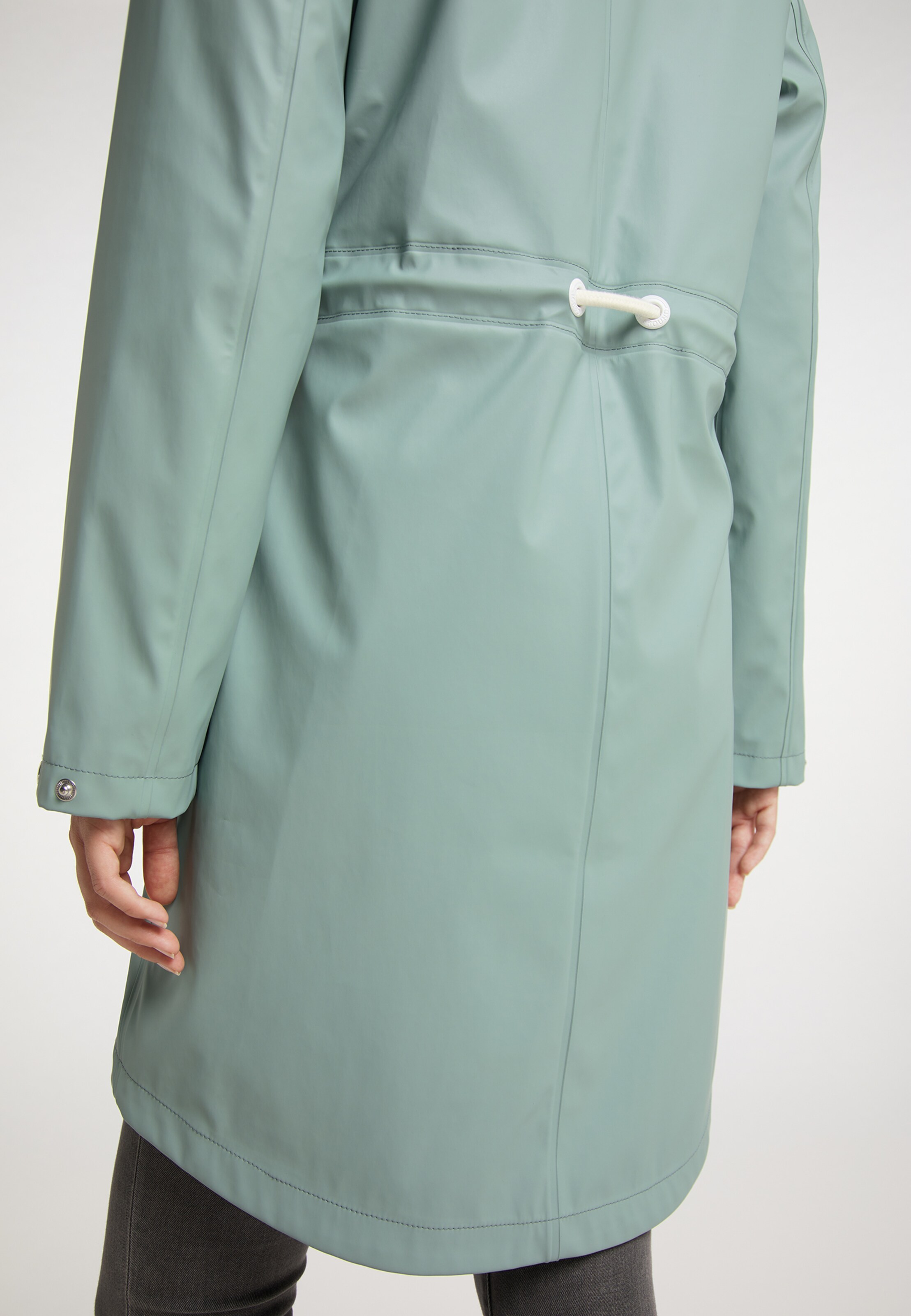 mint green raincoat