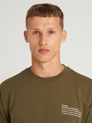 CHASIN' T-Shirt 'Xpose' in Grün