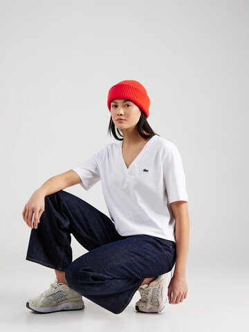 LACOSTE T-shirt i vit