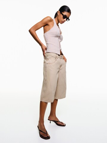 Bershka Wide leg Jeans in Beige: front