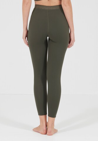 Athlecia Slim fit Workout Pants 'Feliz' in Green