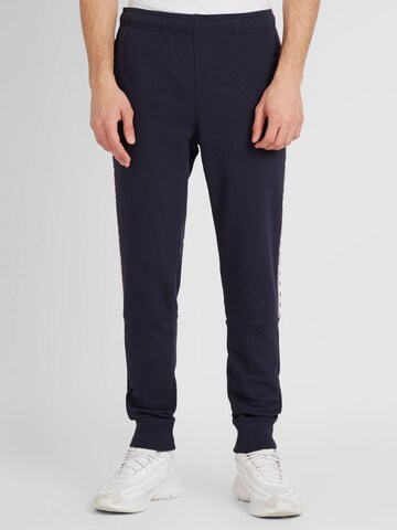 Effilé Pantalon Champion Authentic Athletic Apparel en bleu : devant