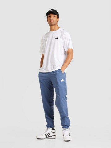 ADIDAS SPORTSWEAR Tapered Urheiluhousut värissä sininen