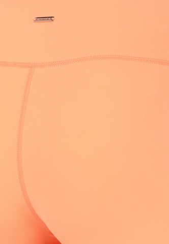 Athlecia Regular Sportbroek 'Bloom' in Oranje