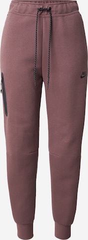 ruda Nike Sportswear Kelnės 'TCH FLC': priekis