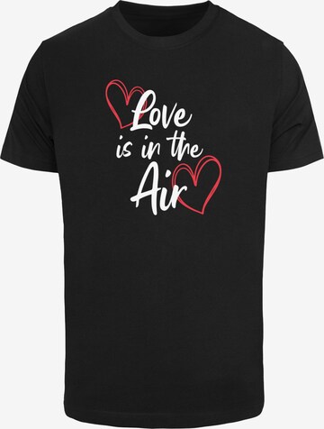 Maglietta 'Valentines Day - Love is in the Air' di Merchcode in nero: frontale