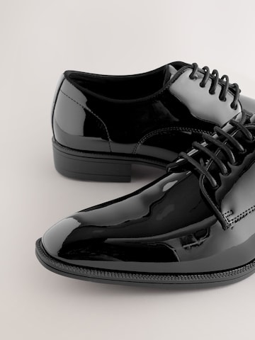 Next - Zapatos con cordón en negro