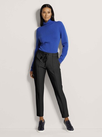 MADELEINE Slimfit Broek in Zwart