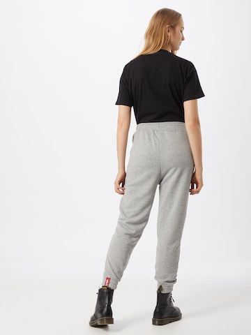 Effilé Pantalon ALPHA INDUSTRIES en gris