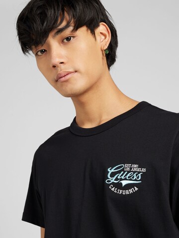 GUESS T-Shirt in Schwarz