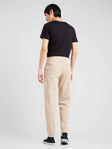 ALPHA INDUSTRIES Tapered Broek in Beige