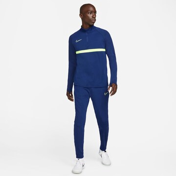 Effilé Pantalon de sport NIKE en bleu