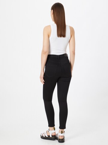 Skinny Jeans di Monki in nero