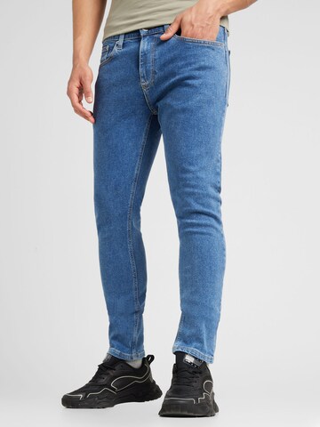 Tommy Jeans Slimfit Jeans 'AUSTIN SLIM TAPERED' in Blauw: voorkant