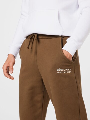 žalia ALPHA INDUSTRIES Siaurėjantis Kelnės