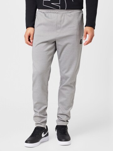 Hummel - Slimfit Pantalón deportivo en gris: frente